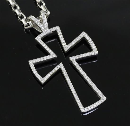 A modern Theo Fennell 18ct white gold and diamond set openwork cross pendant, on a Theo Fennell chain